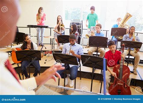 Pupils Playing Musical Instruments In School Orche Stock Photo Image