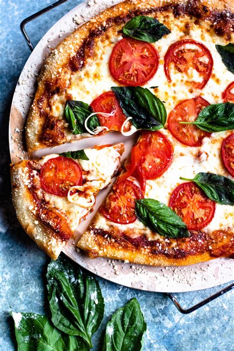 Homemade pizza dough may sound difficult to you. Homemade Margherita Pizza Recipe - The Foreign Fork ...