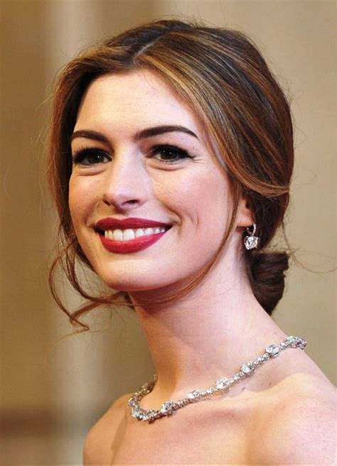 Anne Hathaway Center Part Loose Bun Updo Hair Styles Womens