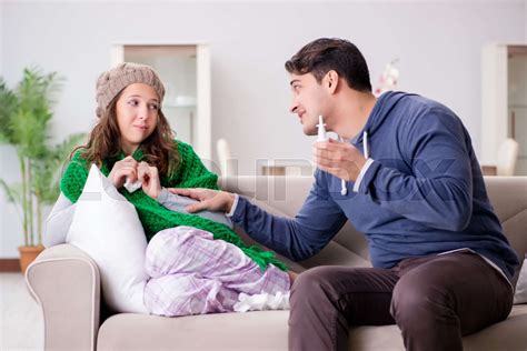 husband caring for sick wife stock image colourbox