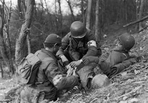 Tending To The Wounded In The Ardennes While The Allied Forces