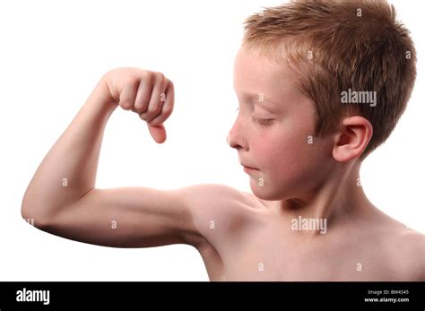 Young Boy Age 8 Flexing His Muscles Stock Photo Alamy
