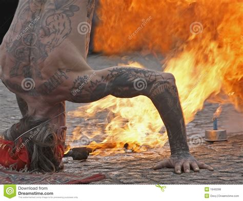 Fire Spitting Man In Headstand Editorial Stock Photo Image Of