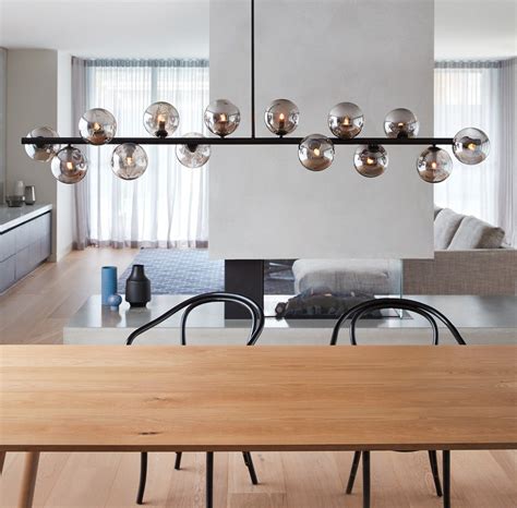 Sku 039072 product type lighting brand lucci décor warranty 12 months from date of purchase width / diameter (mm) 1246 height (mm) 275 suspension 1800 voltage 240v globe included yes globe type g9 globe quantity 15 wattage. Orion 14 Light Pendant in Black/Smoke | Beacon lighting ...