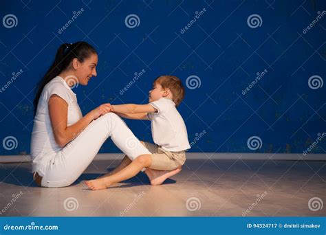 mom keeps her son at the hands stock image image of autumn outdoor 94324717