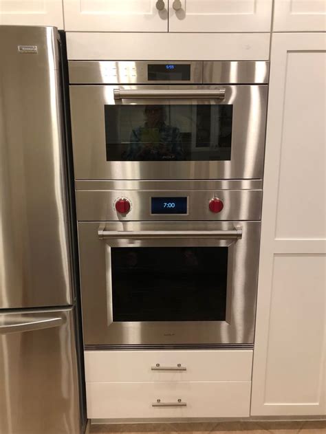 The wolf gourmet countertop oven with convection is a compact convection oven (duh!) that can fit on your kitchen counter without taking up too much space. Custom filler strip between a Wolf M Series Convection ...