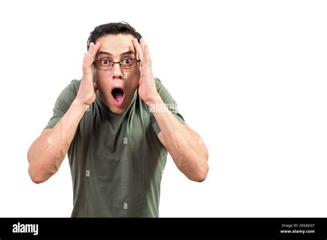 Shocked Male Nerd In Glasses Looking At Camera Stock Photo Alamy