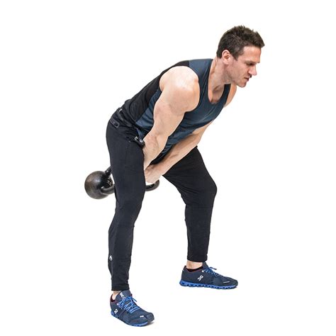 Double Kettlebell Swing Exercise Video Guide Muscle And Fitness