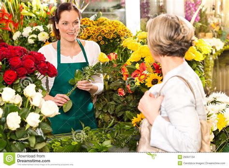 Pete's fresh market is a family owned and operated business that believes in giving you the best quality products for the best value. Young Woman Arranging Flowers Shop Market Selling Stock ...