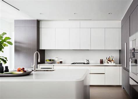 We enjoy minimalist kitchens because they all look so clean, simple and tranquil. Minimalist White Kitchen - TheBestWoodFurniture.com