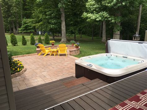 deck with hot tub paver patio fire pit and sitting wall hot tub patio hot tub backyard hot