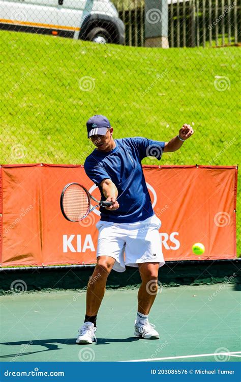 Amateur Black African Male Tennis Player Practicing On A Sunny Day