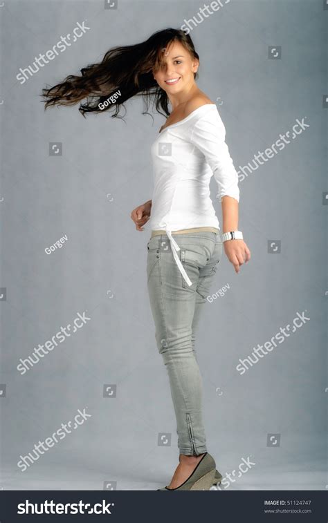 Beautiful Young Woman Turning Around Stock Photo 51124747 Shutterstock