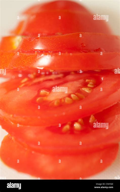Slices Of Tomato On A White Background Stock Photo Alamy