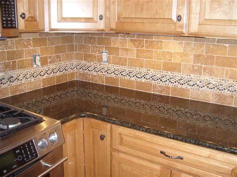 Dampen a sponge and wipe down the tumbled marble tile. Tumbled Marble Backsplash with Epoxy Grout -Completed Proj ...