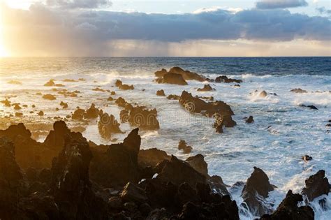 Sunset On The Rocky Shore Of A Tropical Island Stock Photo Image Of