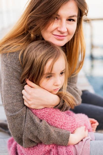 Free Photo Beautiful Mother Hugging Daughter Close Up