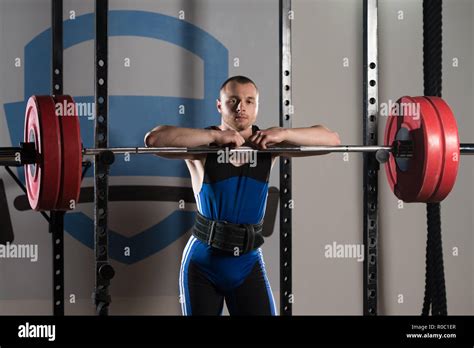 Portrait Of Muscular Powerlifter Bodybuilder Fitness Model Standing