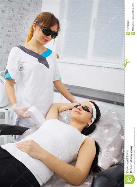I've been using it for a month now. Woman Having Legs Laser Hair Removal Epilation In Cosmetic ...