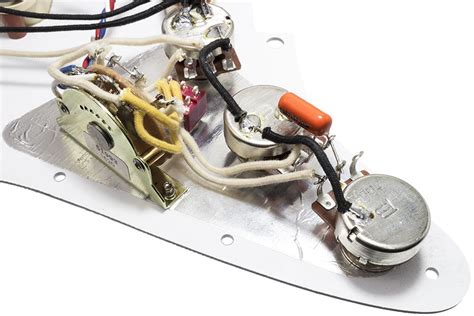 A telecaster with its pickups wired in series differs in that when both pickups are on at the same time, the combination produces higher output and a fatter tone. Fender Vintage Noiseless Telecaster Neck Pickup 3 Wires ...