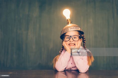 Young Nerd Girl With Thinking Cap High Res Stock Photo Getty Images