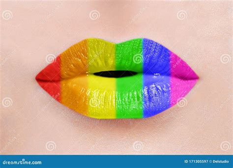 close up of caucasian woman perfect lips with rainbow lipstick lgbt lesbian love and pride