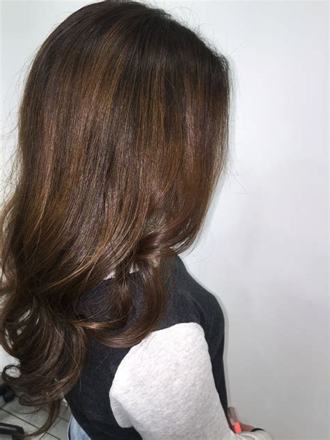 Rich Almond Balayage On Grown Out Highlights With A Soft Curl Finish