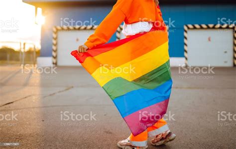 Beautiful African American Lesbian Woman With Lgbt Rainbow Flag At