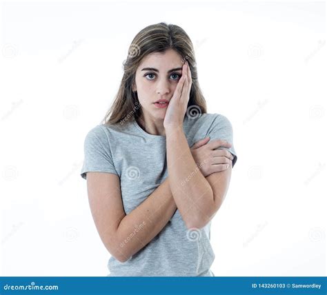 Portrait Of Sad And Intimidated Woman Isolated In White Background