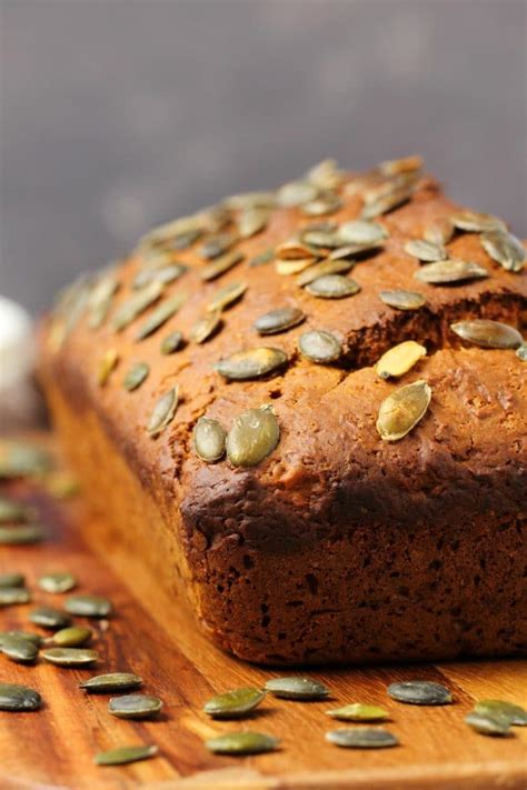 Moist And Deliciously Spiced Vegan Pumpkin Bread Topped With Pumpkin