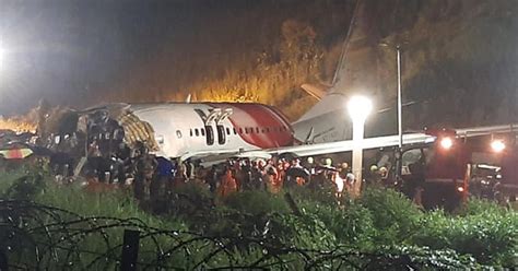 Air India Express Plane Skids Off Runway Killing At Least 18 And