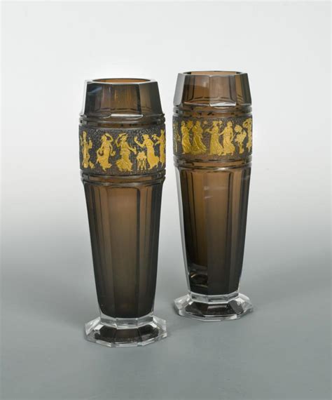 A Pair Of Moser Glass Vases The Facetted Amethyst Glass Vases Each Etched And Gilded With A In