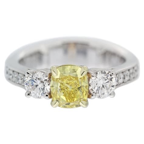 Uneek 7.31 carat cushion cut fancy yellow diamond engagement ring, in platinum. Cushion Cut Yellow Diamond Engagement Ring | Mouradian ...