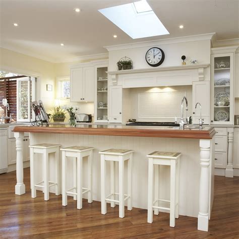 Place these set of two bar stools around your kitchen island or indoor bar area to complete the chic look. White Wood Bar Stools - HomesFeed