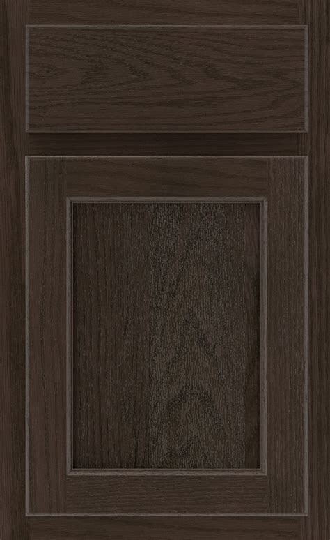 Our commitment to consistently deliver on the high expectations we set for ourselves has kept our customers loyal and growing strong. Thatch Cabinet Finish on Oak - Kemper Cabinetry