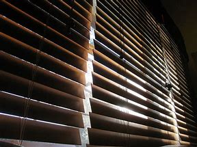 Image result for wikicommons images Peaking through blinds