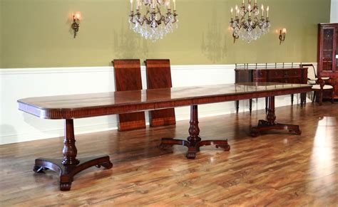 Here's a couple of photos of the 10 foot long custom slab dining room table being sanded down and shaped. Regency Style Triple Pedestal Dining table Opens to 16 Feet