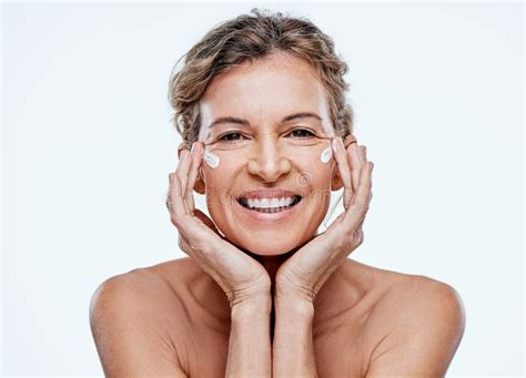 a good moisturiser will do most of the work for you shot of a mature woman posing with