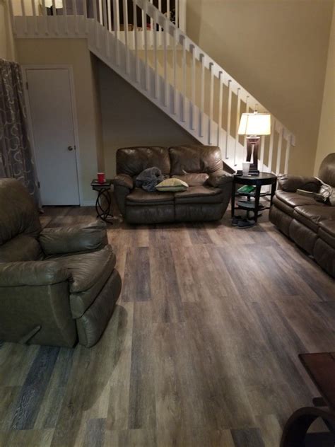 This embossed flooring looks and feels like genuine hardwood but has none of. Lifeproof Walton Oak Vinyl Plank Flooring. We layed it in ...