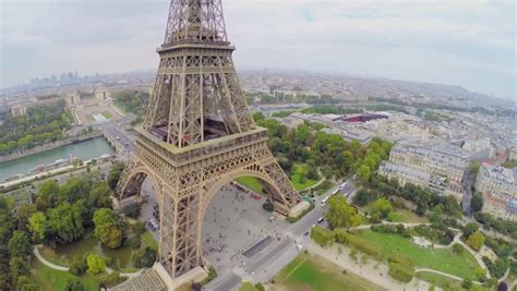 View Of Eiffel Tower From Far Away In Paris France With Moving Clouds