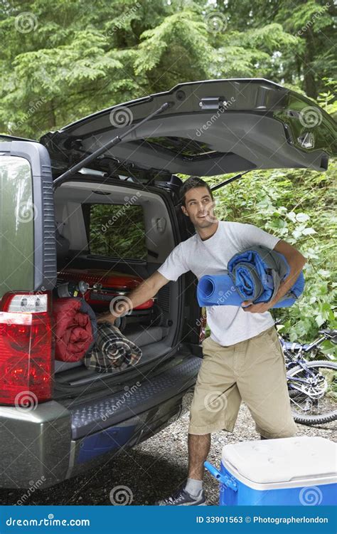 Man Unloading Car In Forest Stock Image Image Of Carrying Cropped 33901563
