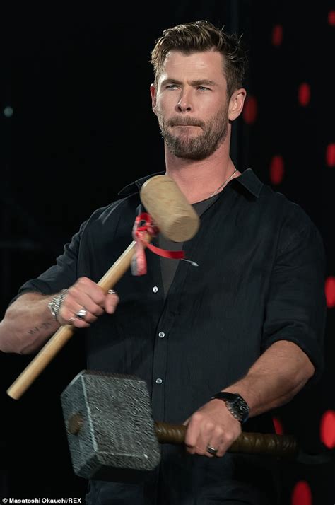 Chris Hemsworth Shows Off His Hammers As He Makes An Appearance At