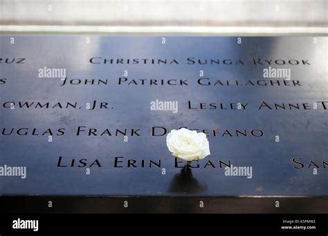 911 Memorial Name Plaque With Rose For Victims Birthday At Ground Zero