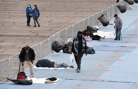 hundreds of homeless in las vegas sleep six feet apart in parking lot after their shelter was