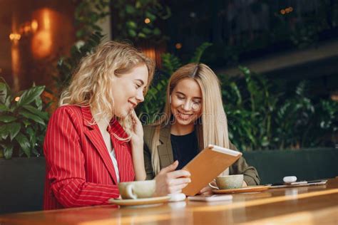 Two Businesswomen Working In A Cafe Stock Photo Image Of Office