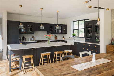 A large kitchen island in a Shaker kitchen. | Open plan kitchen living