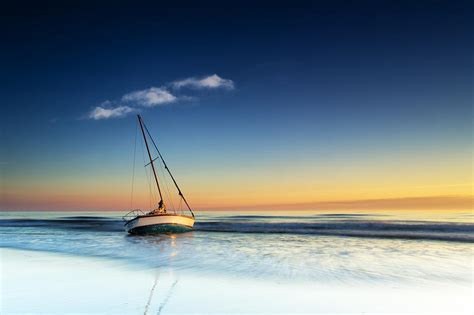 Sunrise Sailboat Photograph By Jay Wickens Fine Art America