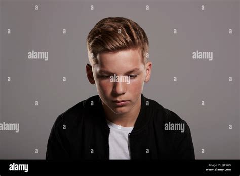 White Teenage Boy Looking Down Head And Shoulders Stock Photo Alamy