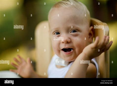Young Boy Playing Peek A Boo Stock Photo Alamy