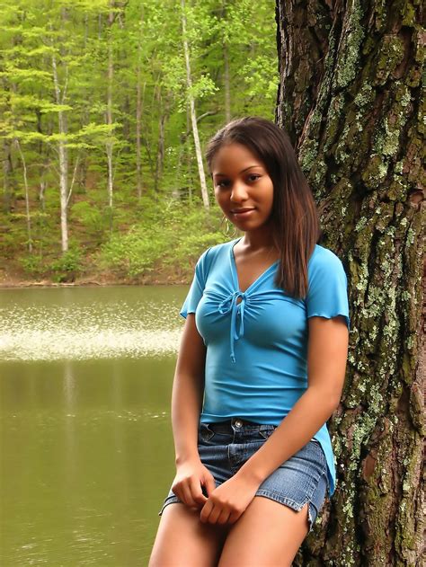 Girl Beautiful Free Stock Photo A Beautiful African American Teen Girl Posing Against A Tree